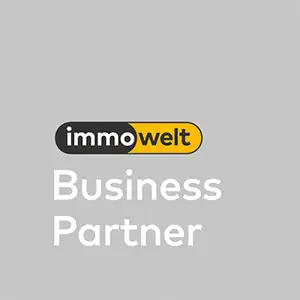 Immowelt Business Partner Logo auf grauem Hintergrund
