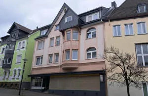Wohn- und Geschäftshaus mit schönen Stil-Elementen in direkter Zentrumslage